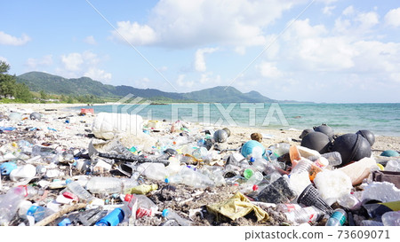 Marine plastic trash at the beach 73609071