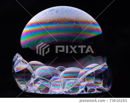 Soap foam and bubbles isolated on black background Soap foam and bubbles isolated on black background 73610283