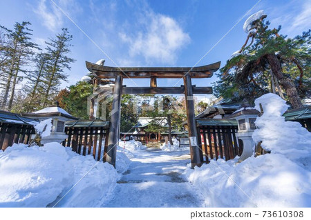 Uesugi Shrine in winter Torii and approach to Yonezawa City, Yamagata Prefecture 73610308