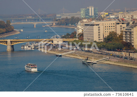 View of the tower bridge on the boats river Danube of the historic Old Town of Budapest Hungary from a height. View of the tower bridge on the boats river Danube of the historic Old Town of Budapest Hungary from a height. 73610641