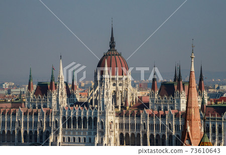 View of the tower Hungarian parliament rooftops of the historic Old Town of Budapest Hungary from a height. 73610643