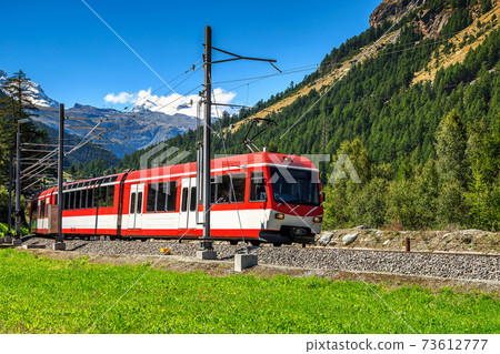 Electric red tourist train,Switzerland,Europe Electric red tourist train,Switzerland,Europe 73612777