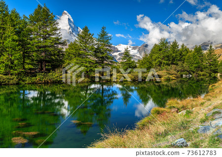 Spectacular summer alpine landscape with Grindjisee lake,Zermatt,Switzerland,Europe 73612783