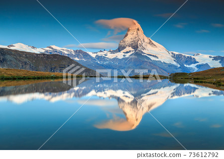 Magical sunrise with Matterhorn peak and Stellisee lake,Valais,Switzerland 73612792