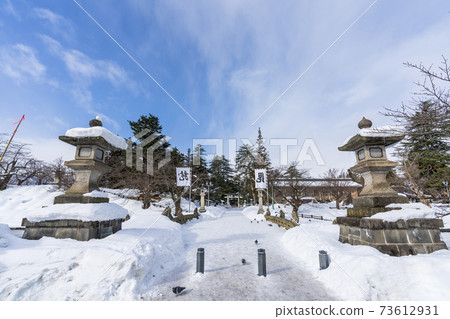 Uesugi Shrine in winter Torii and approach to Yonezawa City, Yamagata Prefecture 73612931