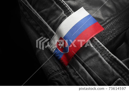 Tag on dark clothing in the form of the flag of the Slovakia 73614597