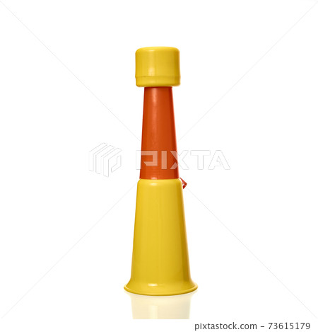 Vuvuzela trumpet Yellow cheer on a white Vuvuzela trumpet Yellow cheer on a white 73615179