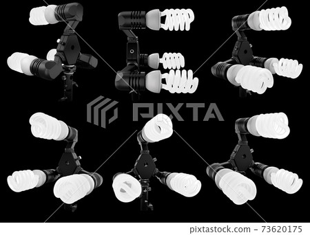 Lightbulbs in lamp holder on studio stand isolated on black background 73620175