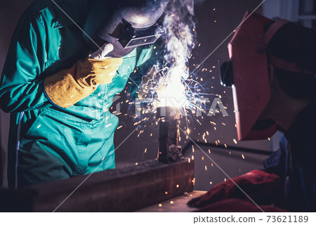 Metal welding steel works using electric arc welding machine Metal welding steel works using electric arc welding machine 73621189