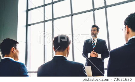 Group of business people meeting in a seminar conference Group of business people meeting in a seminar conference 73621680
