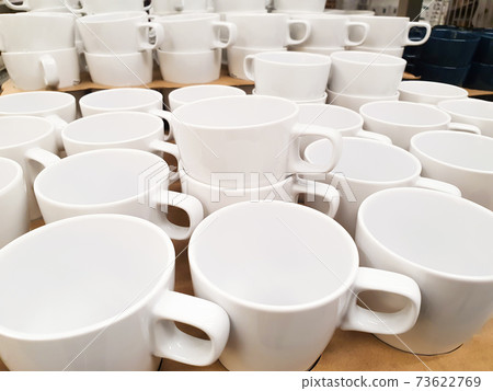 White cups a lot. Store warehouse. 73622769