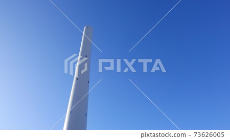 A huge white chimney (wide sky) towering against the blue sky 3636 A huge white chimney (wide sky) towering against the blue sky 3636 73626005
