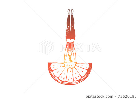 Young woman with slim figure doing handstand on piece of orange, workout, yoga and vegetarian food Young woman with slim figure doing handstand on piece of orange, workout, yoga and vegetarian food 73626183