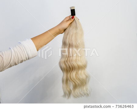 Bundle of blonde natural human hair extensions Bundle of blonde natural human hair extensions 73626463