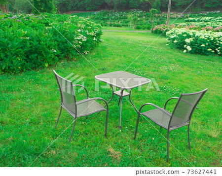 Tsu City Kazahaya no Sato Table and chairs surrounded by hydrangeas Tsu City Kazahaya no Sato Table and chairs surrounded by hydrangeas 73627441