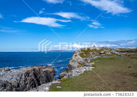 The coastline at Dawros in County Donegal - Ireland 73628323