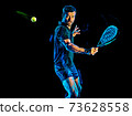 Paddle tennis player man light painting isolated black background 73628558