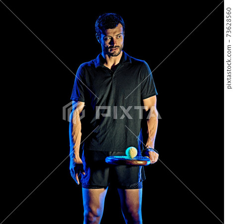 Paddle tennis player man light painting isolated black background Paddle tennis player man light painting isolated black background 73628560