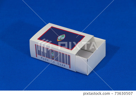 Guam flag on white box with barcode and the color of nation flag on blue background Guam flag on white box with barcode and the color of nation flag on blue background 73630507