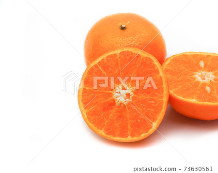 Fresh orange fruit on a white background. Fresh orange fruit on a white background. 73630561