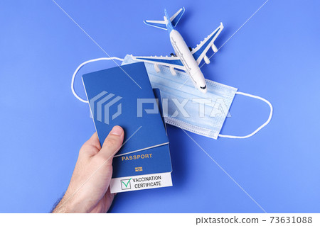 Vaccination passport with green check mark, risk-free travel certificate concept Vaccination passport with green check mark, risk-free travel certificate concept 73631088