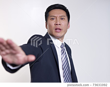 asian business man saying no 73631092