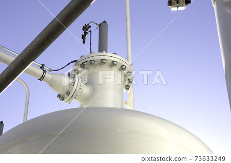 industrial installation with a white tank industrial installation with a white tank 73633249