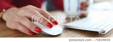 Hand office employee with red manicure on nails 73634650