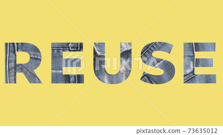 Reuse word from denim on yellow background. Recycle jeans concept 73635012