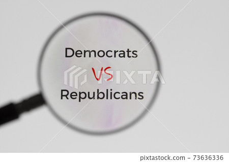 Inscription Democrats VS Republicans on display screen through magnifying glass. Illustrative Editorial. Concept of news. 73636336