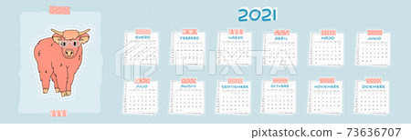 Calendar for 2021 from January to December, Spanish language. Highland cow is on blue color. Every month is on squared paper with dots, piece of newspaper is at the bottom, pink tape is on the top 73636707