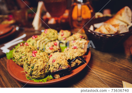 Grilled chicken breast. Fried chicken fillet and fresh vegetable salad of tomatoes, cucumbers and arugula leaves. Chicken meat with salad. Healthy food. Flat lay. Top view. Dark background. 73636740