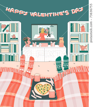 Couple is lying on the bed and watches movies on TV on Valentines Day at home. Heart Pizza, candy and coffee are on a tray. Cabinets with toys and books on the sides of the room 73636755