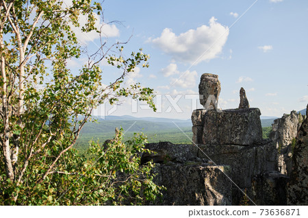 Inzer teeth Inzer rocks near the Tirlyansky village. Russia, South Ural, Bashkortostan Republic, Beloretsky district. Inzer teeth Inzer rocks near the Tirlyansky village. Russia, South Ural, Bashkortostan Republic, Beloretsky district. 73636871
