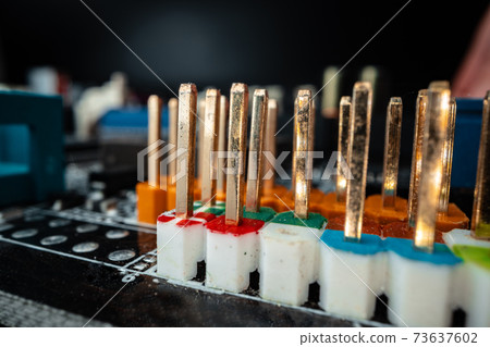 Macro photo of electronic components of a circuit board Macro photo of electronic components of a circuit board 73637602