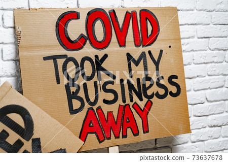Protestive placard against coronavirus lockdowns close up 73637678