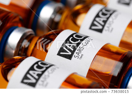 Pile of vials of Sars-cov-2 vaccine close up Pile of vials of Sars-cov-2 vaccine close up 73638015
