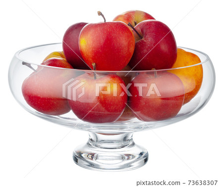 Glass bowl for fruits storage isolated on white Glass bowl for fruits storage isolated on white 73638307