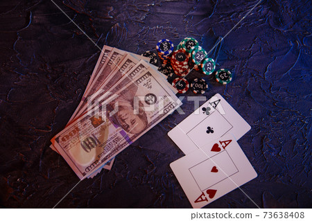 Online casino сoncept. Dollar banknotes, cards and stucks of gambling chips Online casino сoncept. Dollar banknotes, cards and stucks of gambling chips 73638408