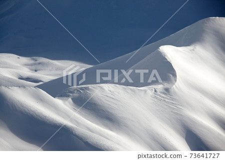 Snowy mountains 73641727