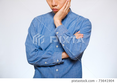 Japanese man thinking 73641904