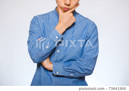 Japanese man thinking 73641908