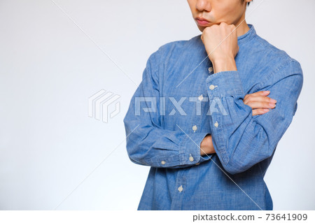 Japanese man thinking Japanese man thinking 73641909
