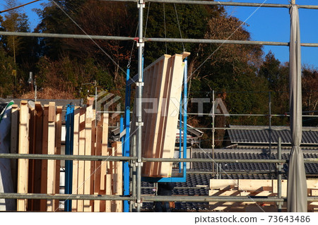 Crane transport of building materials Crane transport of building materials 73643486