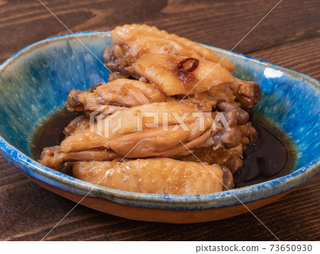 Stewed dish in chicken wings. Japanese food with sweet and spicy chicken wings. 73650930