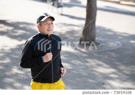 Fitness / health image Japanese senior man jogging Fitness / health image Japanese senior man jogging 73654106