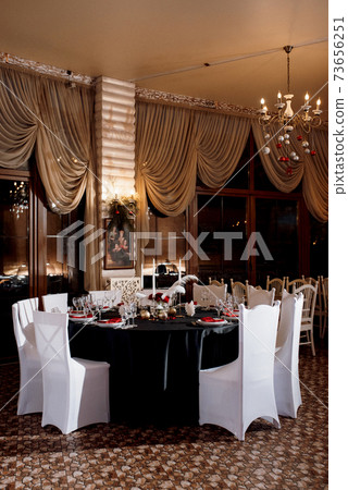 decoration of tables with burning candles 73656251