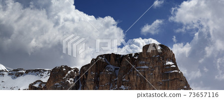 Panoramic view on rocks and blue sky with clouds 73657116