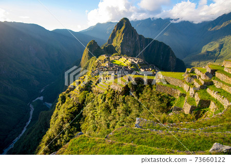 Sunset on Machu Picchu, the lost city of Inca - Peru Sunset on Machu Picchu, the lost city of Inca - Peru 73660122