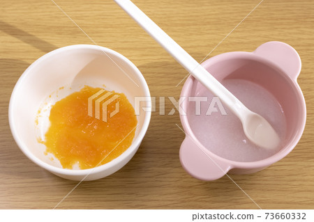 Rice baby food and carrot baby food 73660332